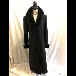 Womens beautifully tailored long black coat by Albert Nipon Studio.